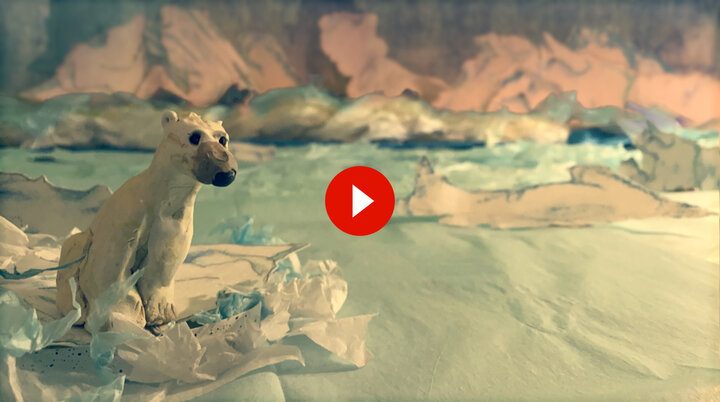 clay model of polar bear on iceberg